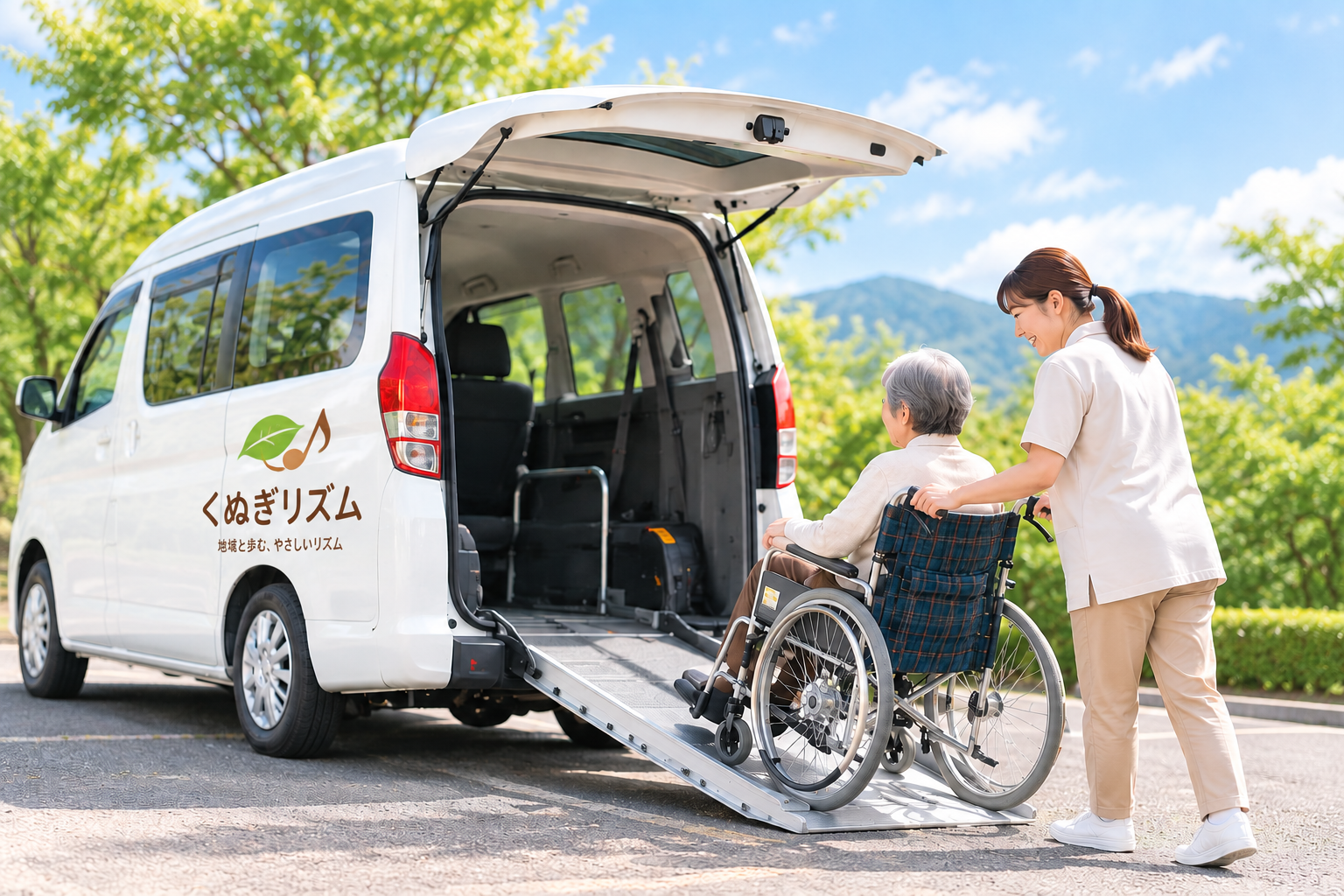 車椅子のまま乗車できる福祉タクシーと介助者